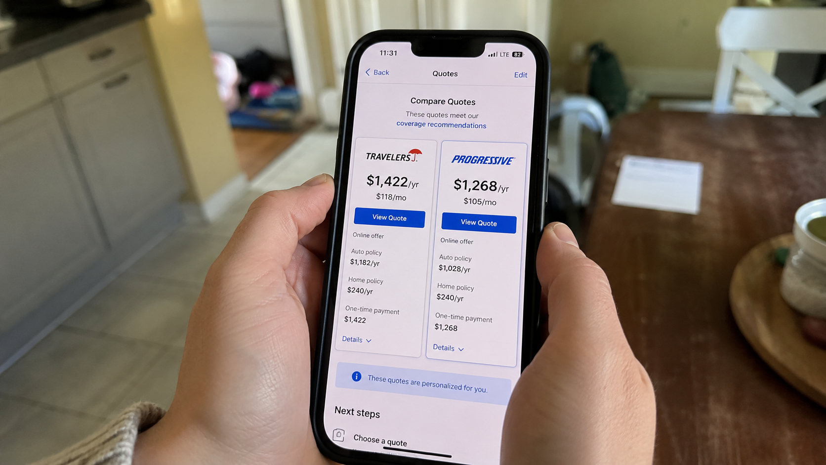 frugal living hacks: hands holding phone showing insurance comparison quotes side by side on screen
