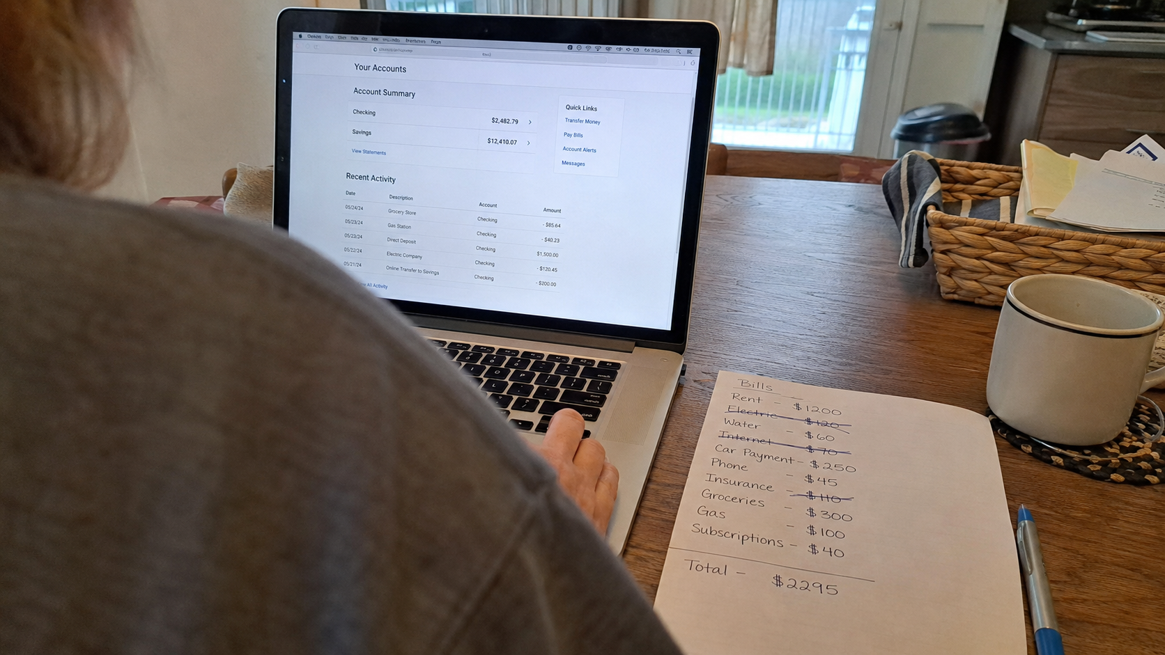 how to save money on bills by reviewing monthly statements on laptop with list of recurring charges visible on screen