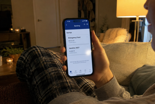 Where to Keep Your Savings: The Right Account for Every Goal person checking savings account rates on phone to decide where to keep savings